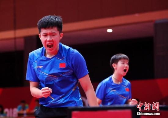 資料圖：雅加達亞運會，王楚欽/孫穎莎奪得混雙冠軍。 <a target='_blank' href='/'>中新社</a>記者 劉關(guān)關(guān) 攝