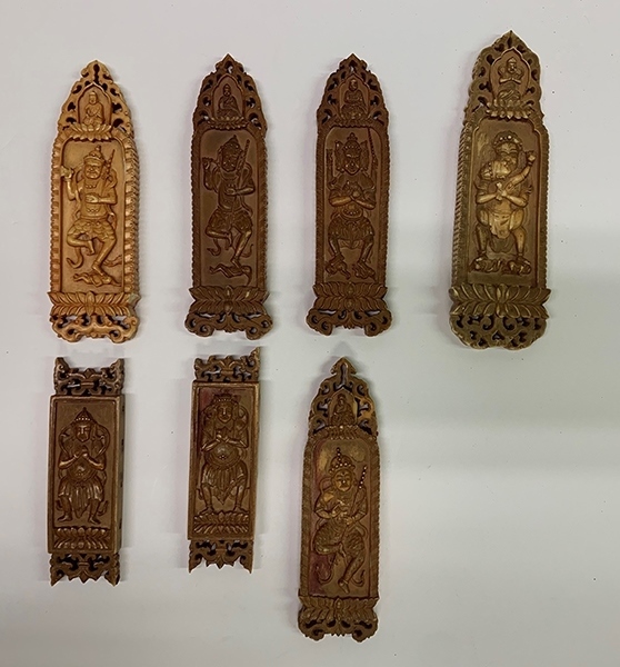 木雕牌飾（暫定名）。國(guó)家文物局供圖